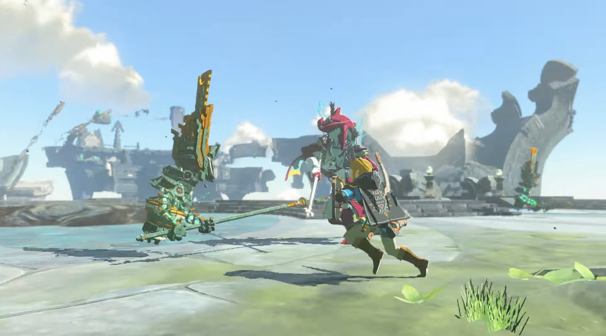 Un'immagine di Link e il principe Sidon che combattono fianco a fianco contro un costrutto in The Legend of Zelda: Tears of the Kingdom.