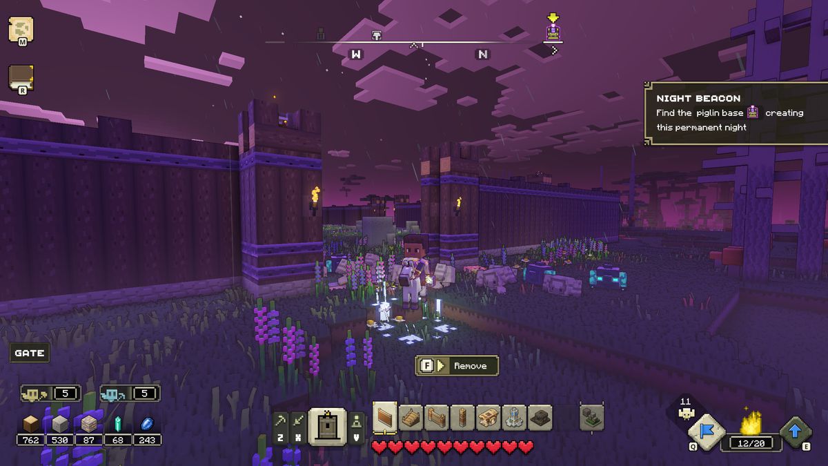 Un personaggio di Minecraft costruisce un muro di notte in Minecraft Legends.