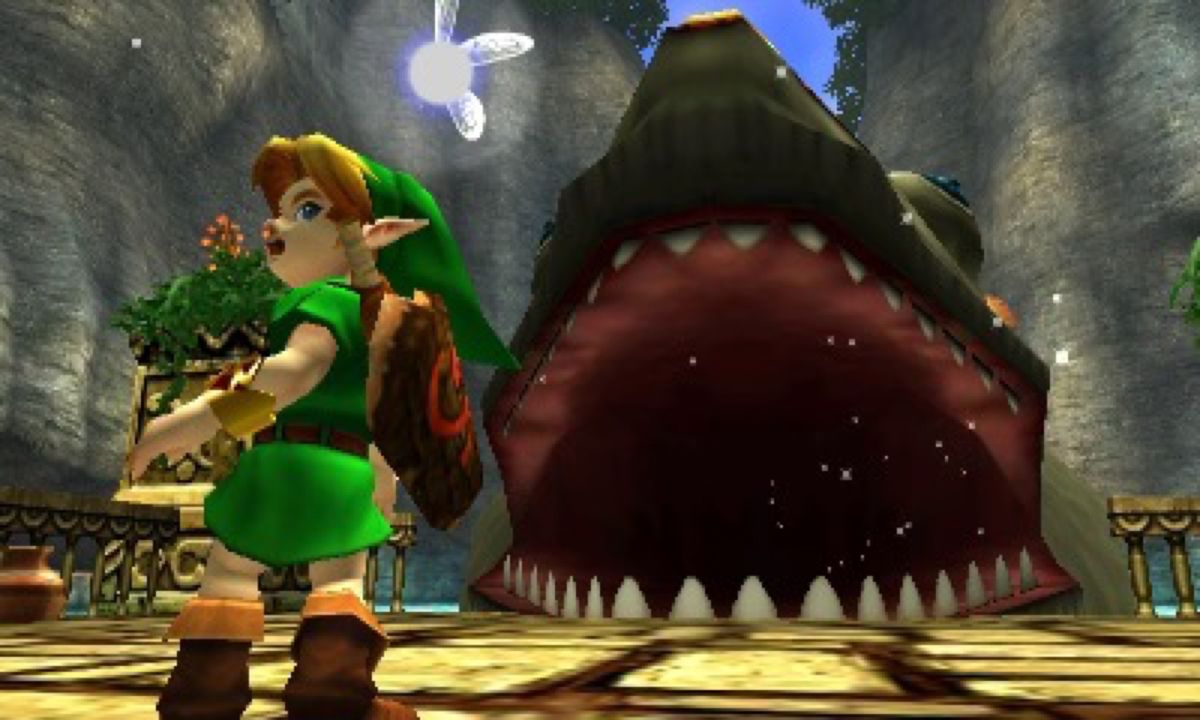 Link si gira per scappare da Jabu-Jabu mentre il pesce gigante si prepara ad inalarlo in The Legend of Zelda: Ocarina of Time 3d