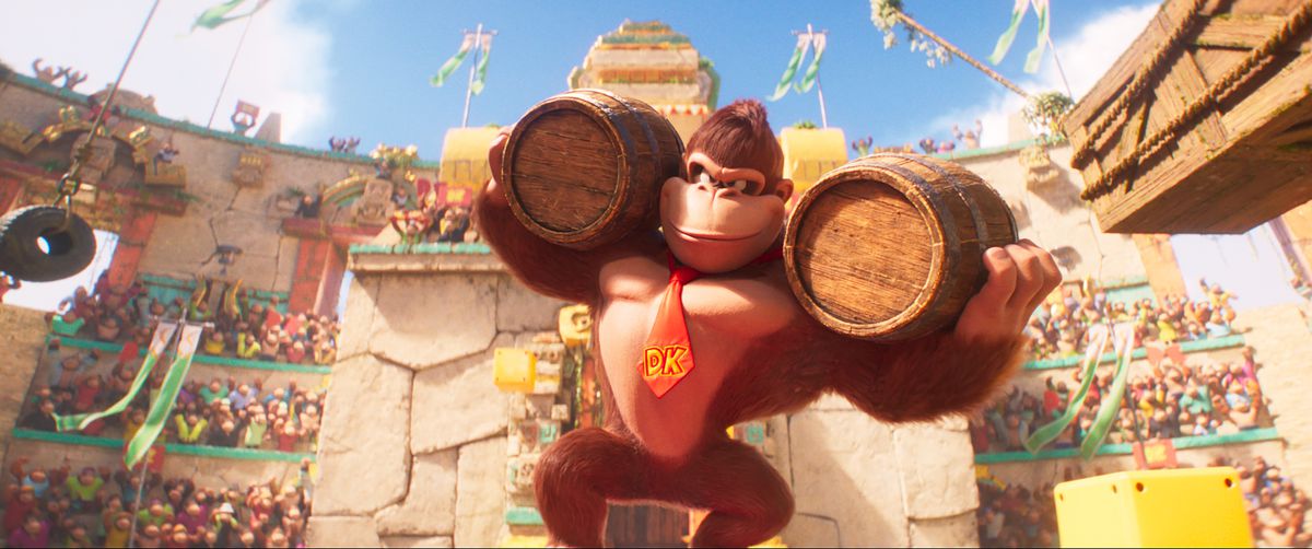 Donkey Kong porta due grossi barili sulle spalle in uno stadio pieno di scimmie in The Super Mario Bros. Movie