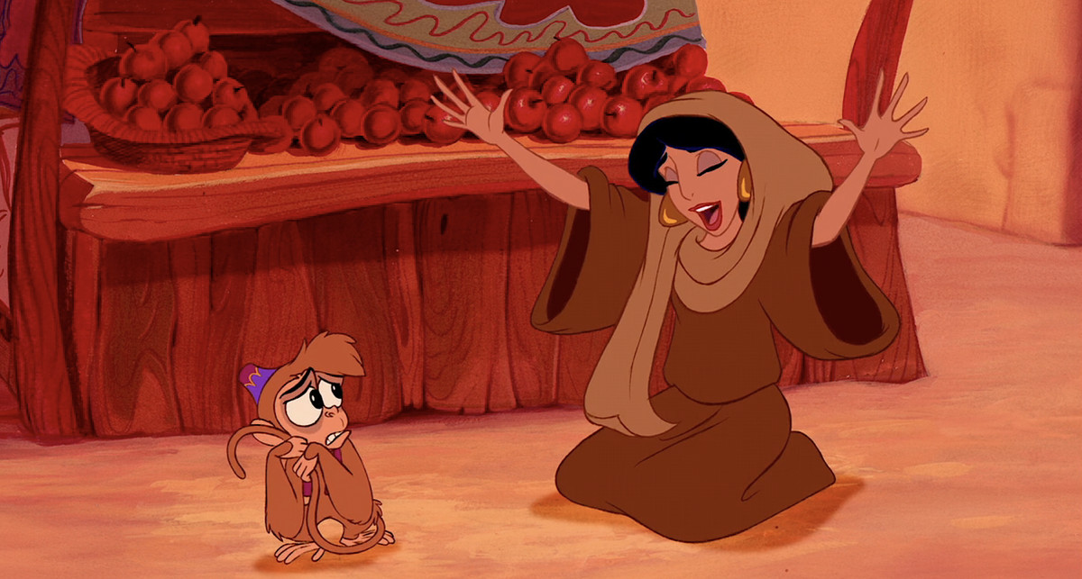 Jasmine in Aladdin della Disney esegue un salaam a Abu la scimmia dall'aria nervosa, fingendo di pensare che sia il Sultano