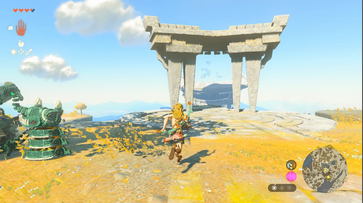 Link corre verso un cancello di pietra sulla Great Sky Island in Tears of the Kingdom.