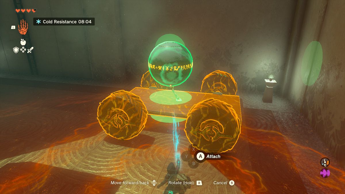 Link usa Ultrahand per attaccare una sfera a un carrello nel Santuario Tukarok in Zelda Tears of the Kingdom.