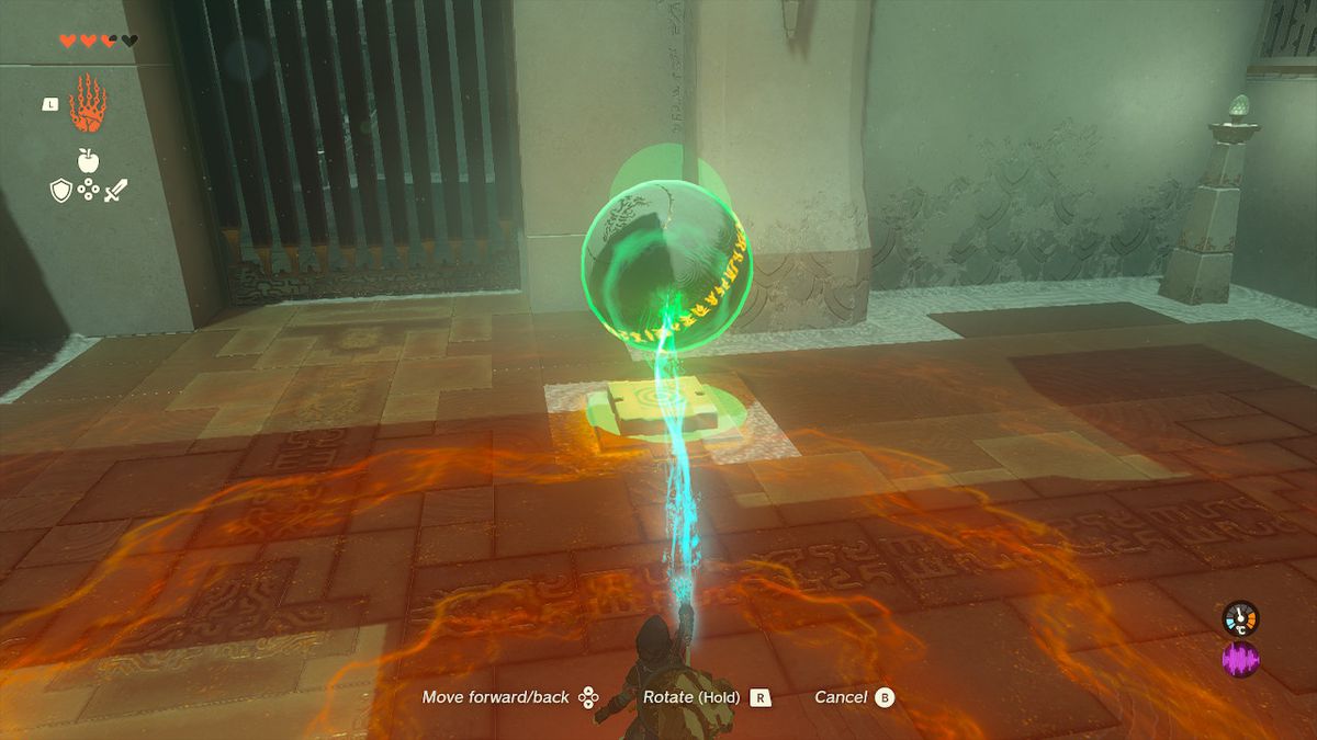Links posiziona una pallina su un pulsante evidente nel Santuario di Tukarok in Zelda Tears of the Kingdom.