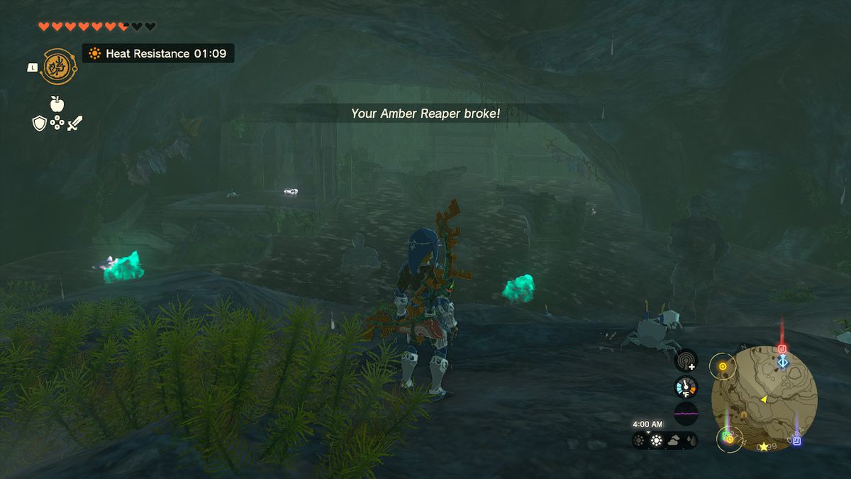 Link si trova di fronte a una stanza allagata con statue e rovine in Zelda: Tears of the Kingdom