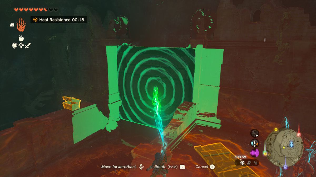 Link usa Ultrahand per far scorrere una porta verso l'alto in modo che l'acqua possa lasciare la stanza in Zelda: Tears of the Kingdom