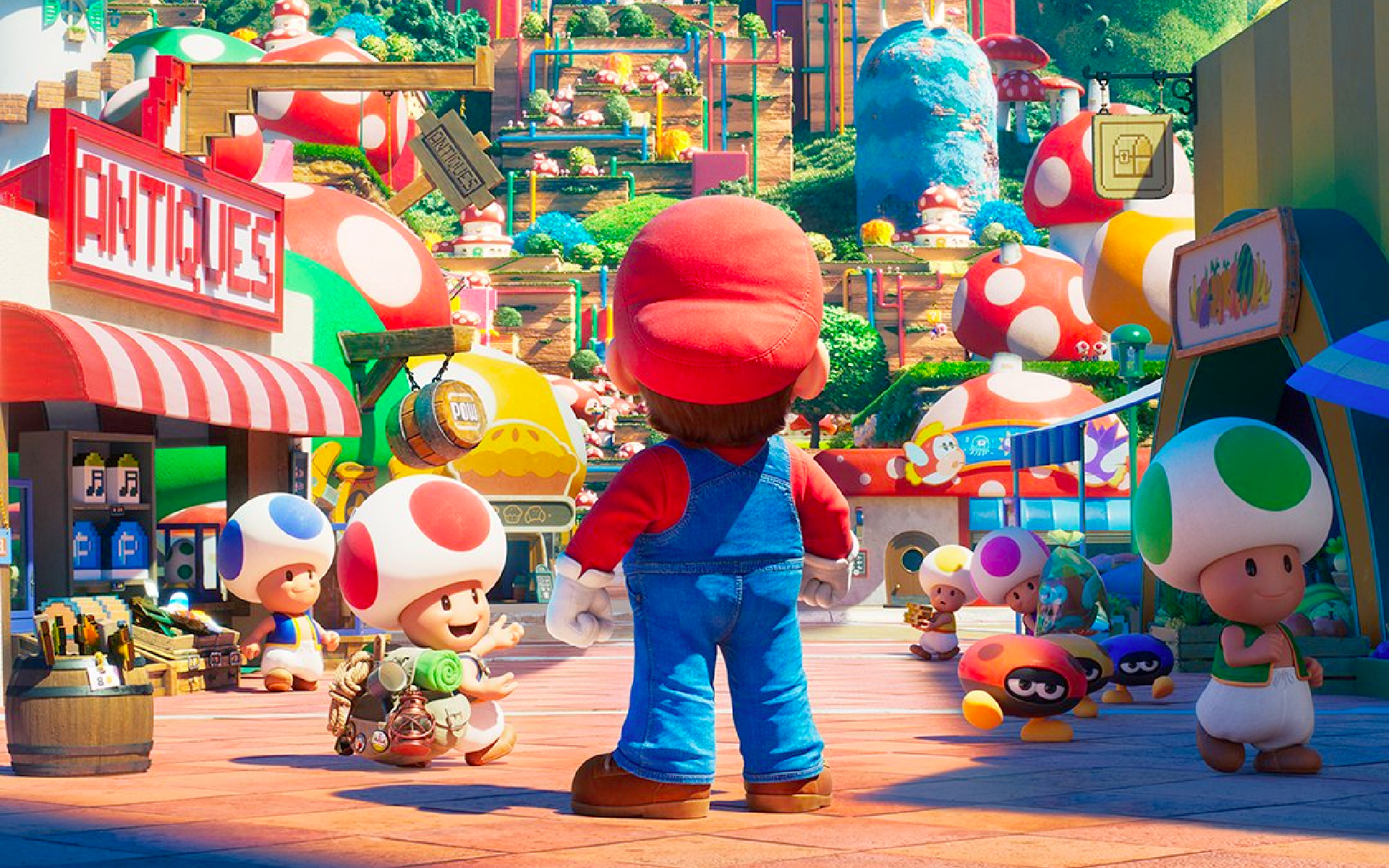 La schiena di Mario mentre si trova in un'affollata via commerciale popolata da Toads nel Regno dei Funghi