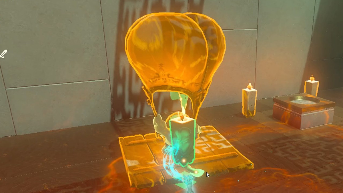 Una mongolfiera con in mano una pallina e una torcia nel Santuario Sinakawak in The Legend of Zelda: Tears of the Kingdom