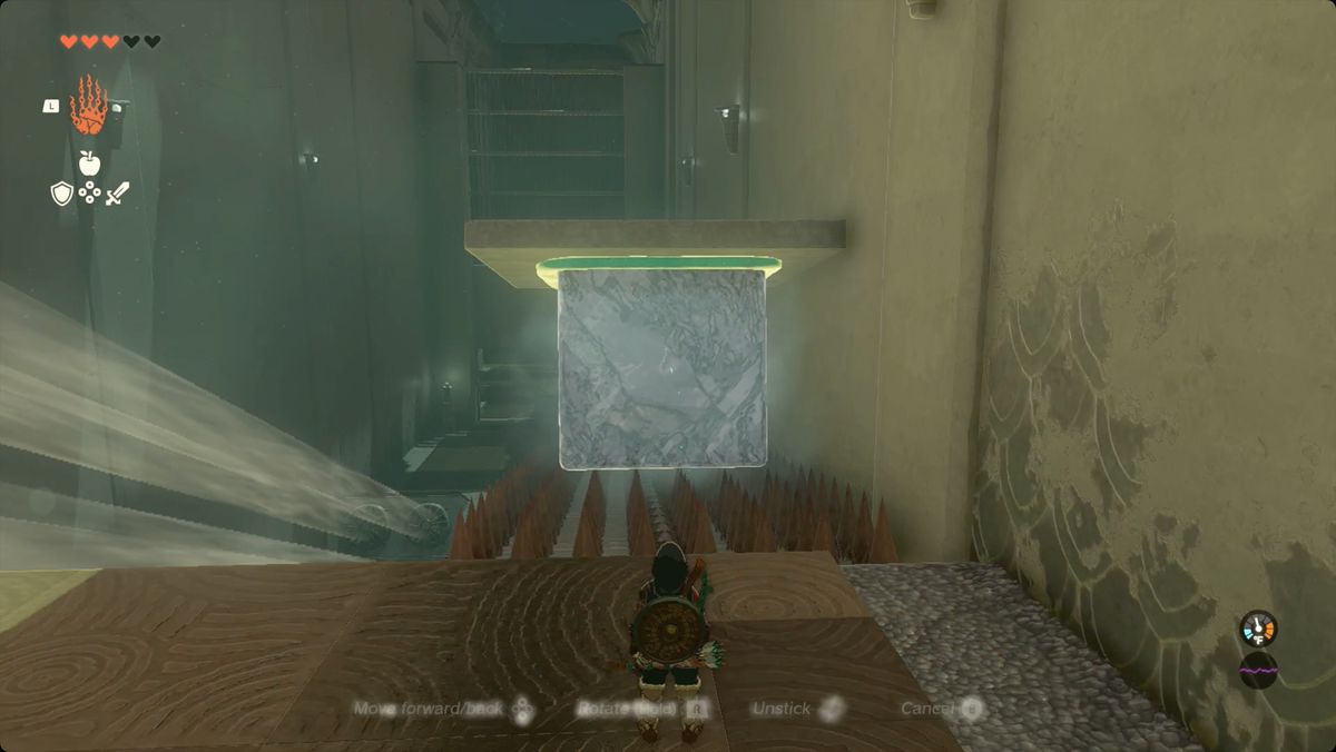The Legend of Zelda: Tears of the Kingdom un gigantesco blocco di ghiaccio con un pannello di pietra in cima che scorre lungo un pendio appuntito nel Santuario Kiuyoyou