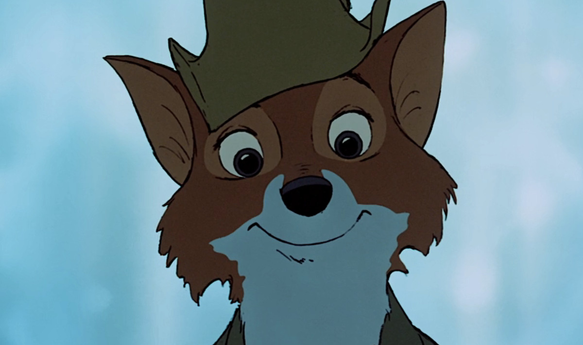 Robin Hood della Disney, una volpe antropomorfa in verde, sorride direttamente alla telecamera durante la canzone 