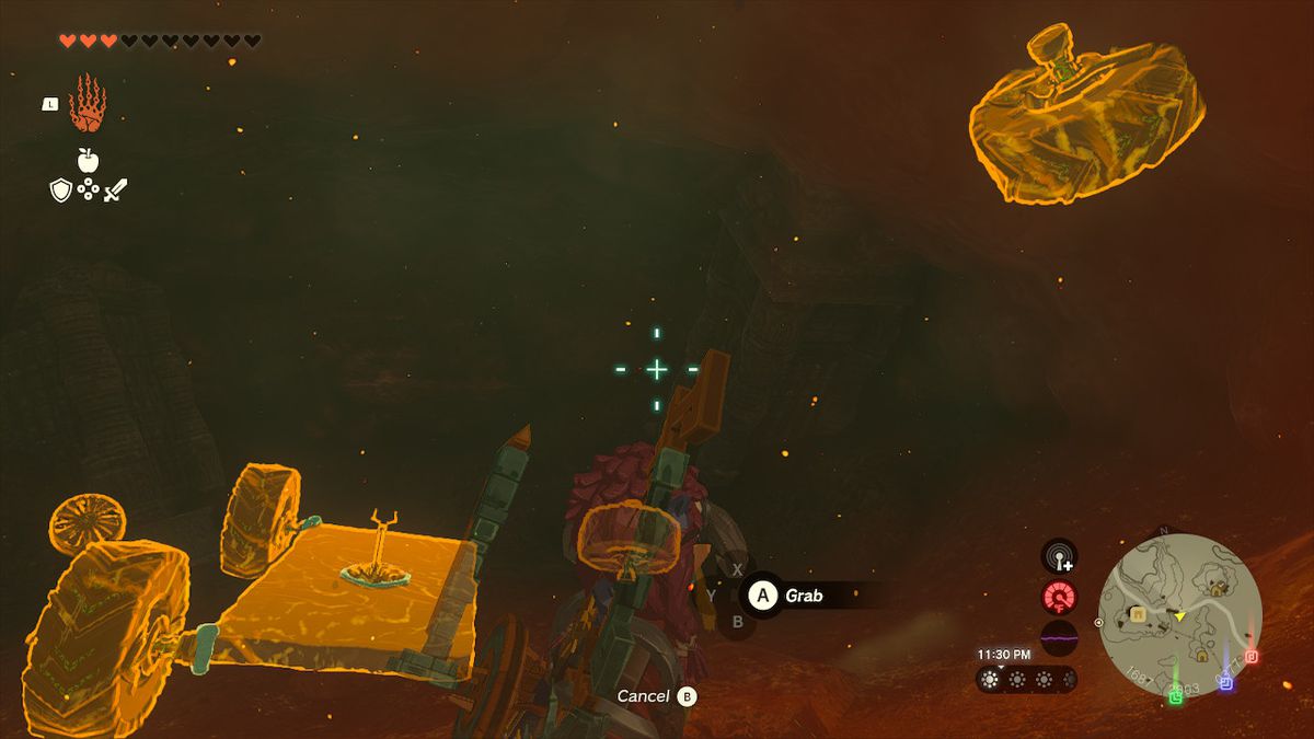 Link usa Ultrahand per afferrare le ruote e completare la costruzione di Zonai in Zelda: Tears of the Kingdom