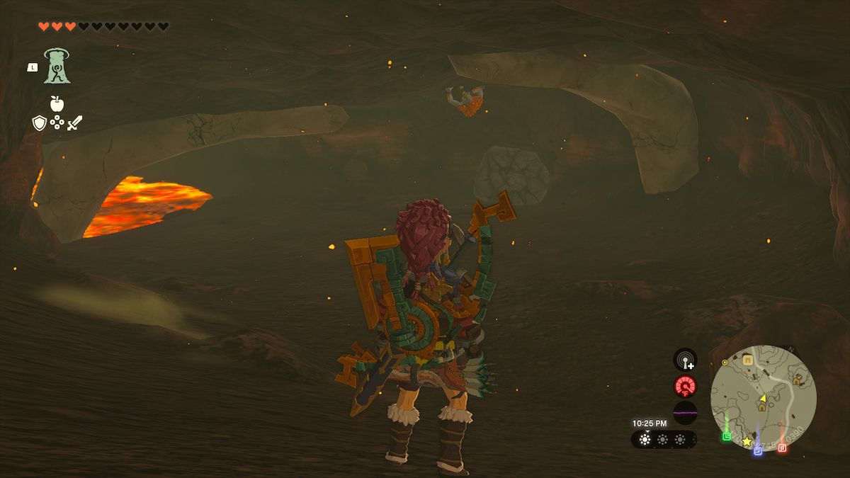 Link usa Ultrahand per spostare una piattaforma rocciosa dall'altra parte del fiume di lava in Zelda: Tears of the Kingdom