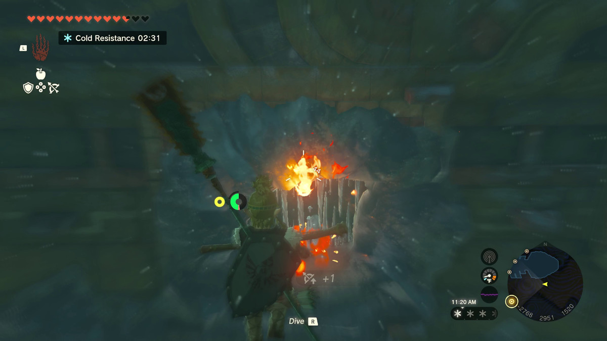 Link si trova davanti a una porta bloccata da ghiaccioli.  Una poltiglia rossa è a terra e sta emanando fiamme per sciogliere il ghiaccio.