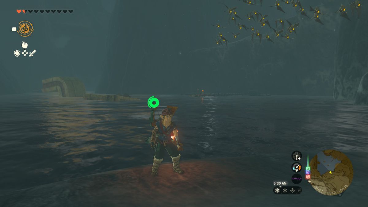 Link si trova di fronte alla grotta del lago Kilsie, guardando indietro, in Zelda: Tears of the Kingdom