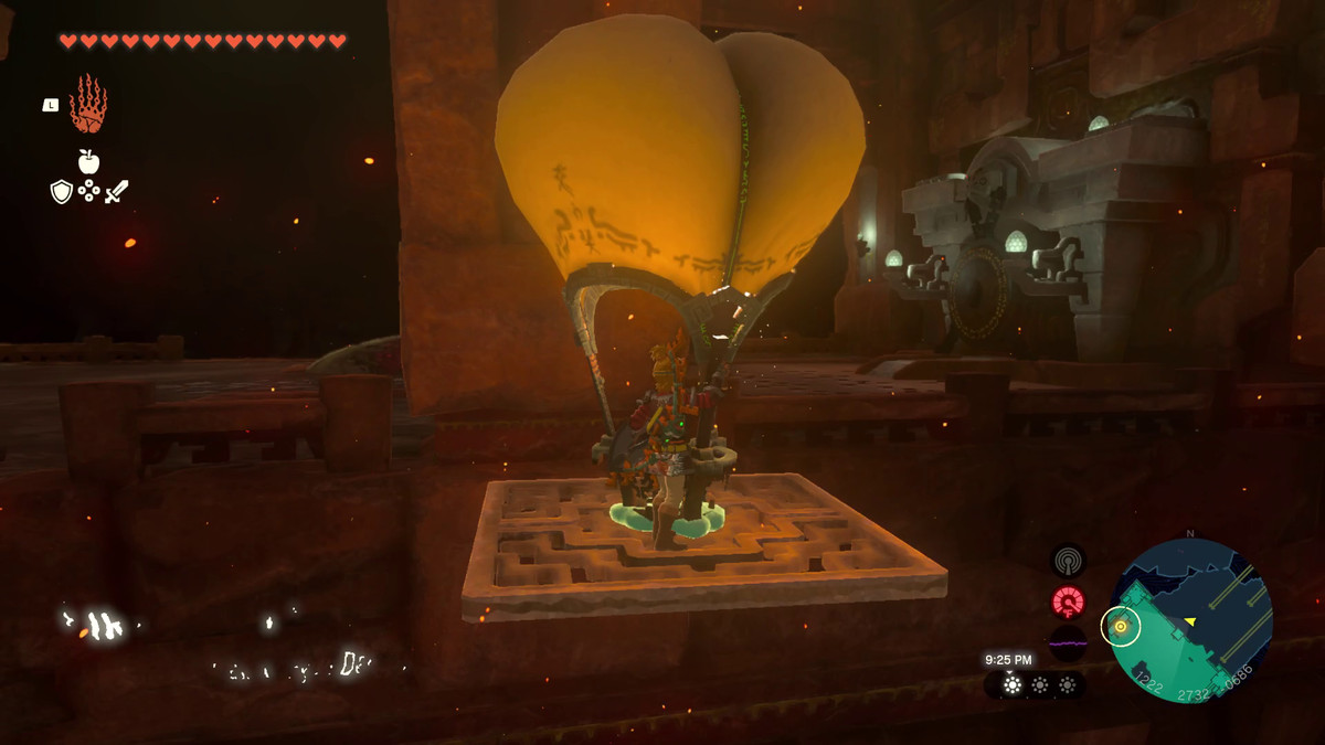 Link sale su una mongolfiera nel Tempio del Fuoco, per vedere un gong in Lacrime del regno.