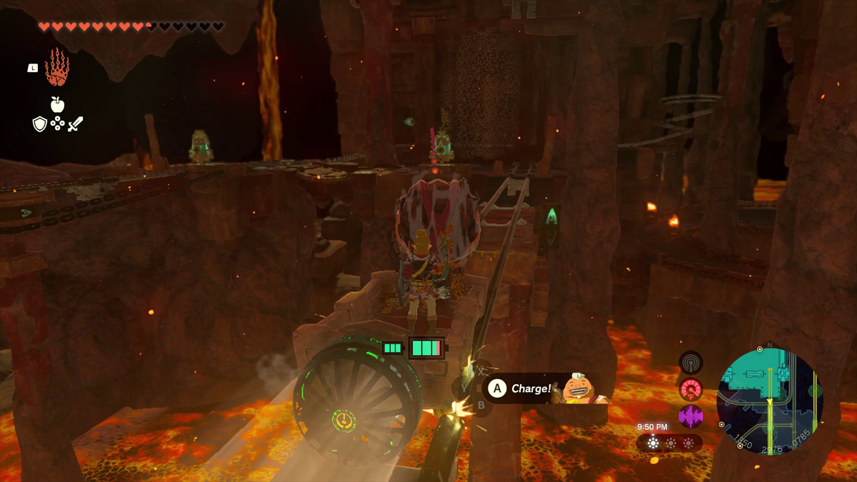 Link guida un carrello da miniera con Yunobo davanti, puntandolo contro uno dei meccanismi rotanti in lontananza in Tears of the Kingdom