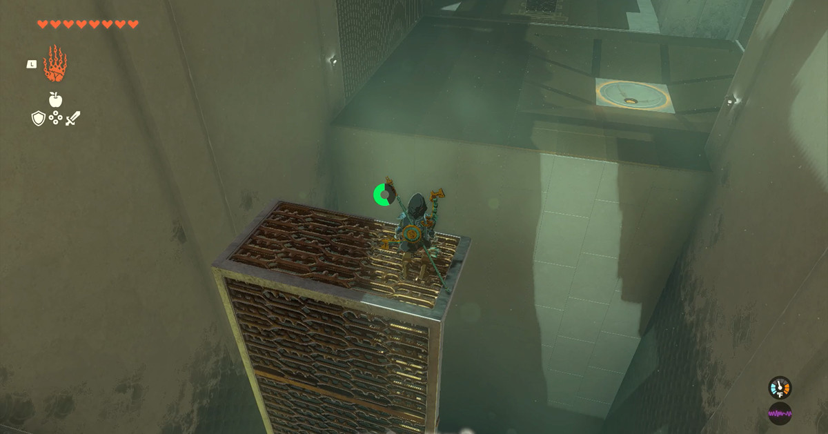Link in piedi sulla sporgenza di un dispositivo verticale in The Legend of Zelda: Tears of the Kingdom