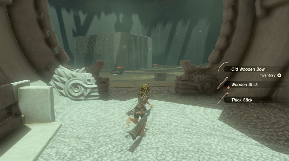 Link raccoglie bastoncini nel Santuario Rasitakiwak in Zelda: Tears of the Kingdom
