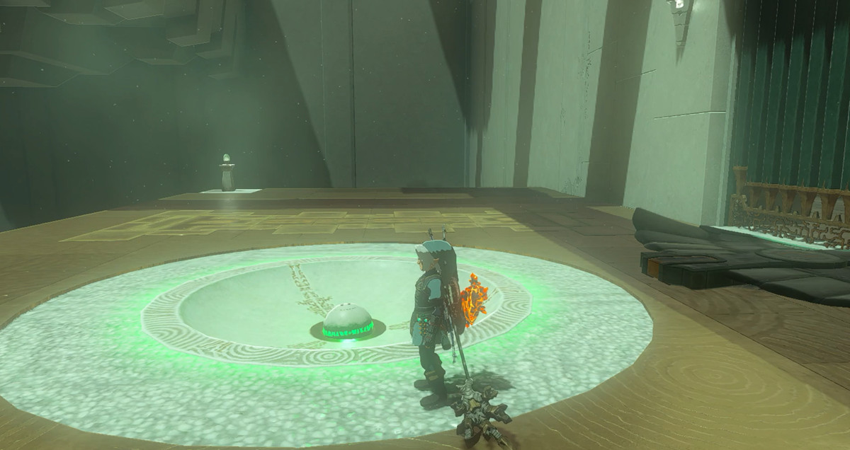 Link mette una palla in un buco nel pavimento in Zelda: Tears of the Kingdom