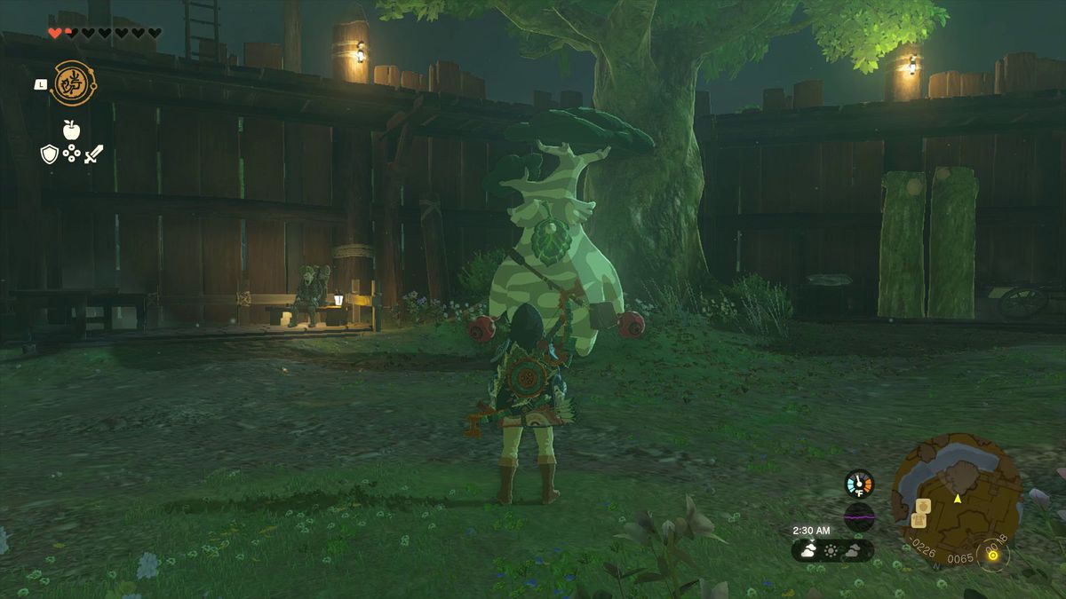 Link si trova di fronte a Hestu, che si sta rilassando accanto a un albero all'interno di Lookout Landing in Zelda: Tears of the Kingdom
