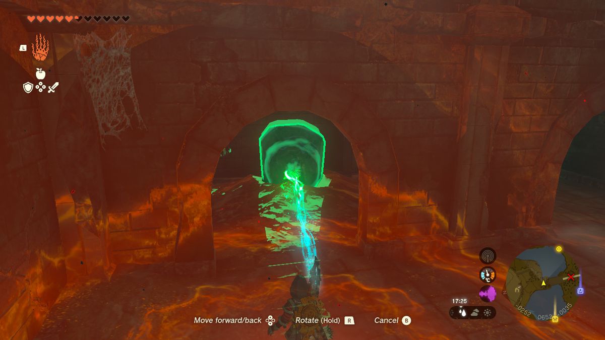 Link usa Ultrahand per far levitare un masso mentre cerca l'armatura del soldato in Zelda Tears of the Kingdom.