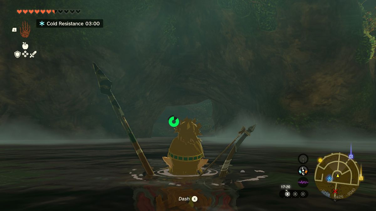 Link nuota in una pozza d'acqua in una grotta in Zelda Tears of the Kingdom.