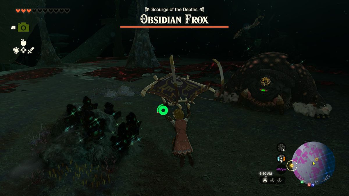 Link atterra dopo essersi tuffato attraverso la voragine delle pianure di Akkala orientale e viene accolto da un Frox di ossidiana in Zelda: Tears of the Kingdom
