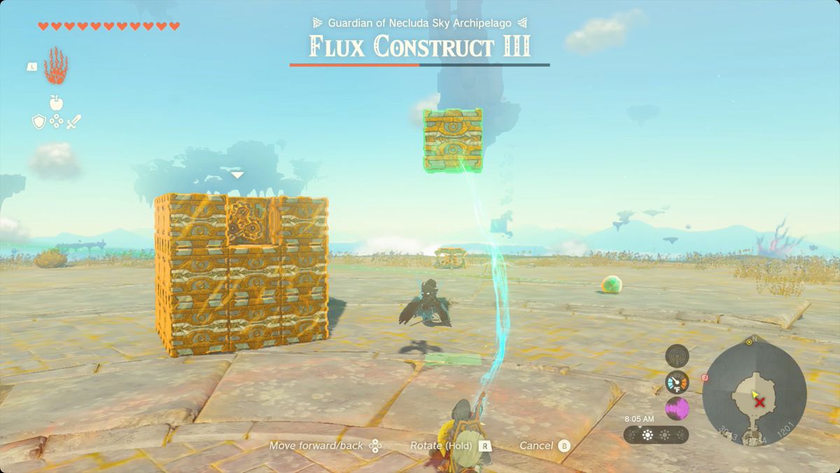 The Legend of Zelda: Tears of the Kingdom Link usando Ultrahand per rimuovere i blocchi da un Flux Construct 3 mentre è in forma di cubo.