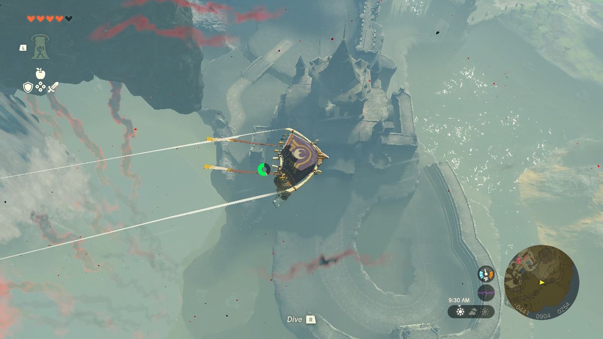 Link plana sopra il Castello di Hyrule in Zelda Tears of the Kingdom.