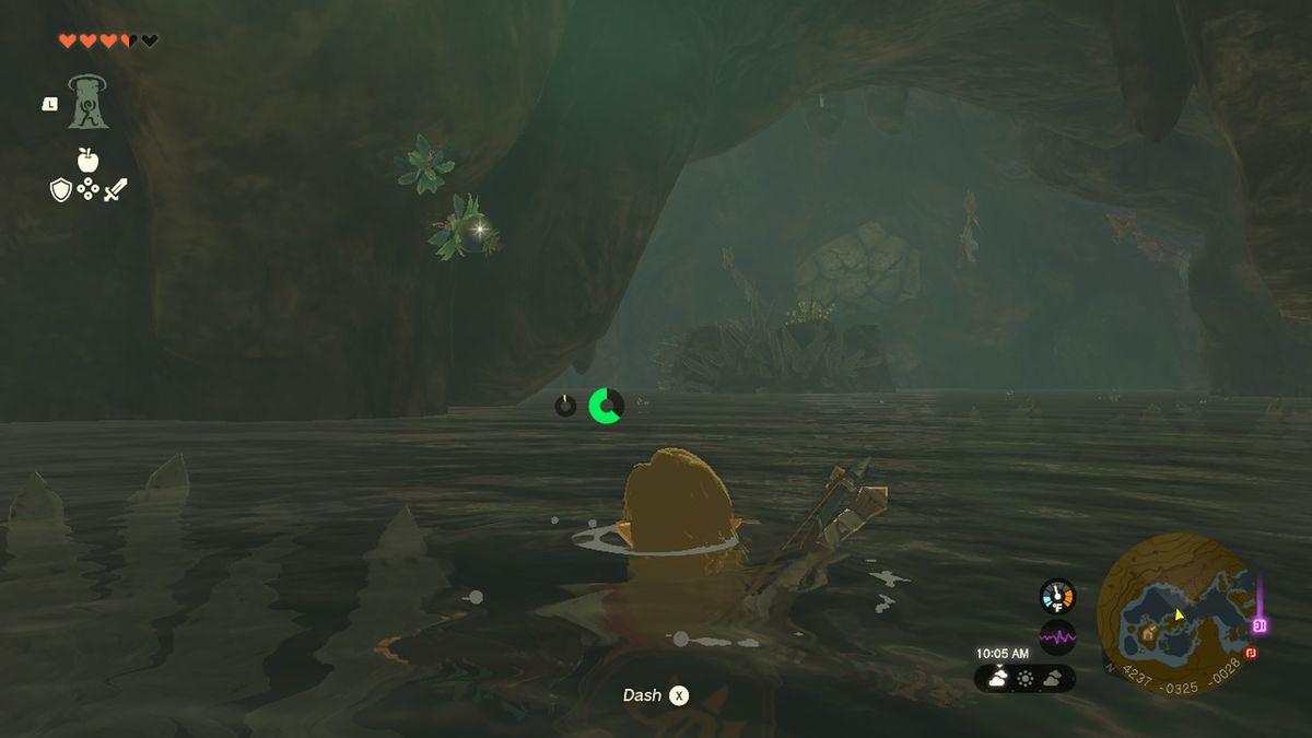 Link nuota verso una grande roccia in un fiume in Zelda Tears of the Kingdom.