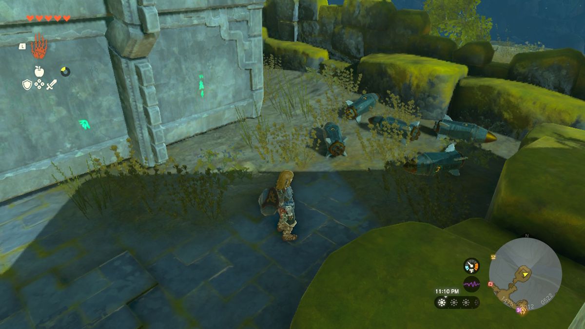 Link si trova vicino ad alcuni dispositivi Zonai durante la notte in Zelda Tears of the Kingdom.