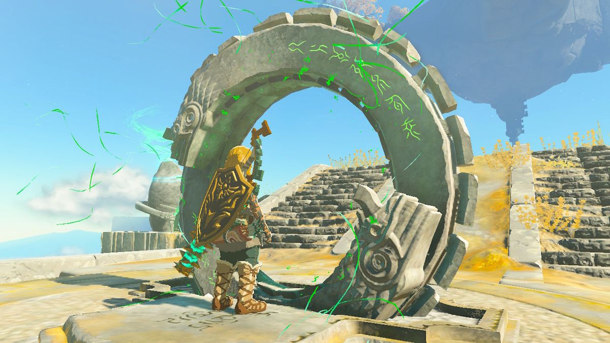 Link si trova accanto a un anello gigante su un'isola del cielo in Zelda Tears of the Kingdom.