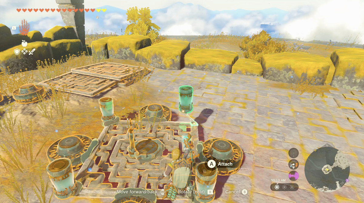 Link costruisce un hovercraft in The Legend of Zelda: Tears of the Kingdom.  La base è una lastra metallica quadrata.  Ci sono batterie in ogni angolo e ventilatori su ogni lato della piazza.  C'è anche uno stick dello sterzo per pilotarlo.
