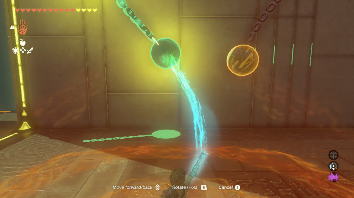 Un'immagine di un puzzle in The Legend of Zelda: Tears of the Kingdom.  Link sta usando Ultrahand per incollare una palla sospesa elettrificata a un'altra palla.  Quello a sinistra oscilla avanti e indietro. 