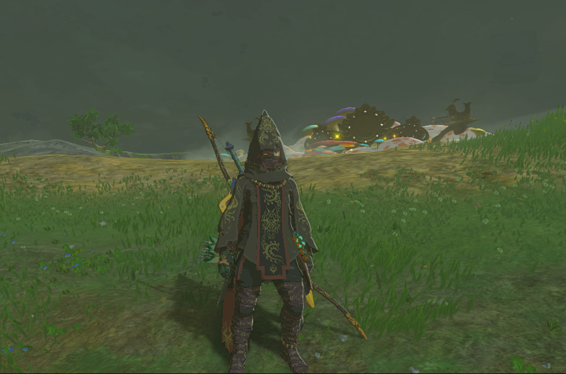 Link indossa l'armatura delle Profondità, che è di tessuto scuro con un cappuccio appuntito, in Tears of the Kingdom