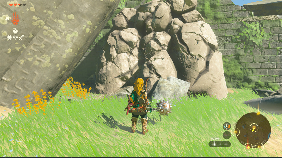 Link frantuma un masso che blocca un percorso in Zelda Tears of the Kingdom.