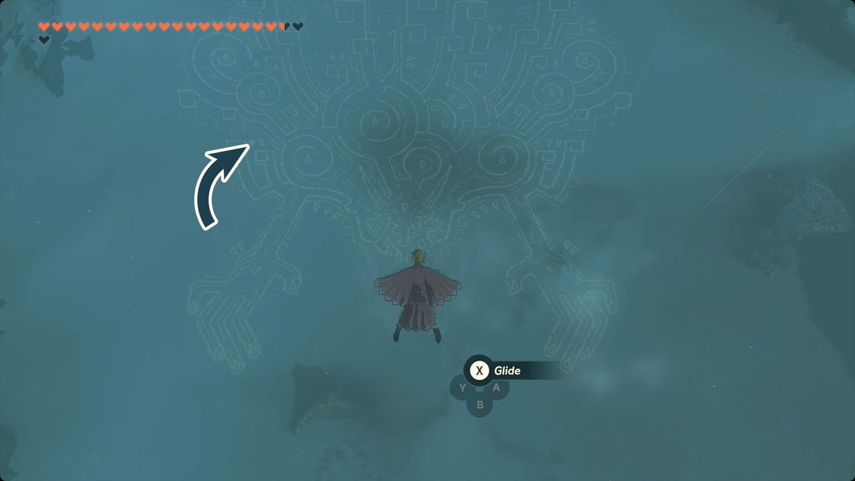 The Legend of Zelda: Tears of the Kingdom Link che vola vicino al geoglifo Nascita del Re Demone con la posizione di Lacrima del Drago contrassegnata.
