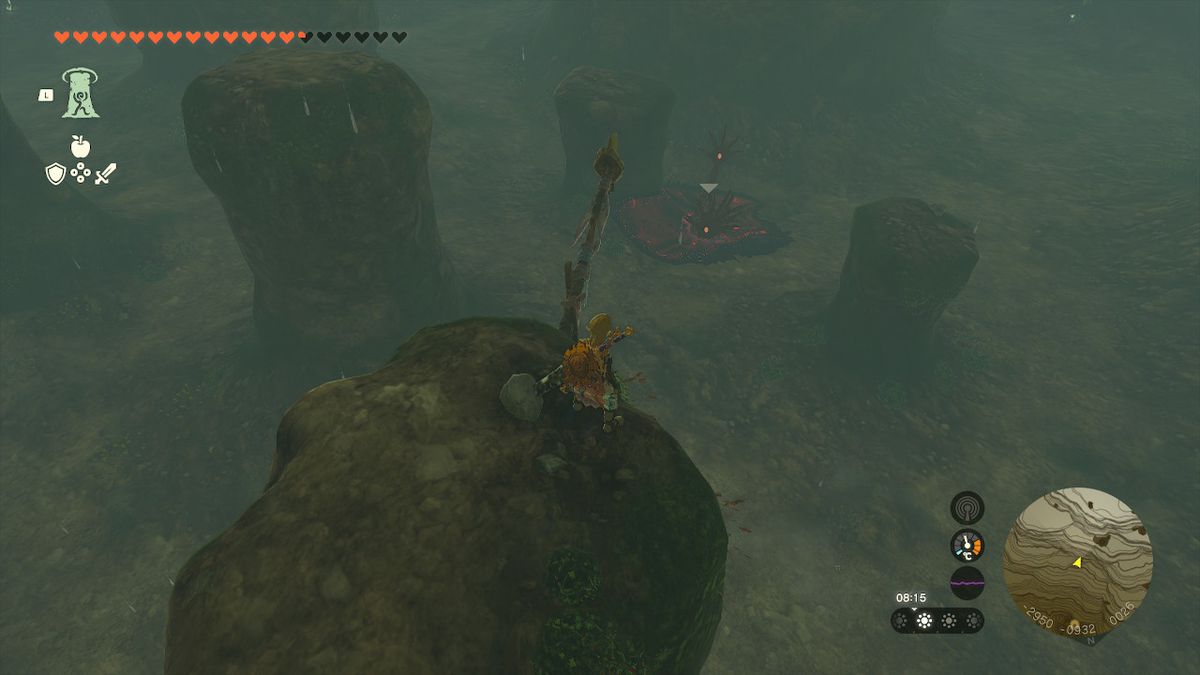 Link si appollaia su una sporgenza sopra Gloom Hands nella grotta a valle del fiume Tamio in Zelda Tears of the Kingdom.