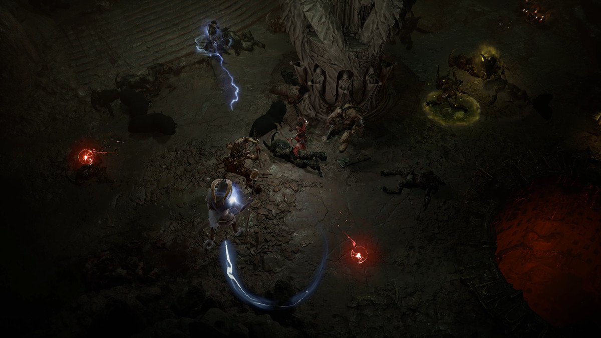 Un personaggio usa un attacco fulmineo simile a una frusta in una stanza scarsamente illuminata in Diablo 4