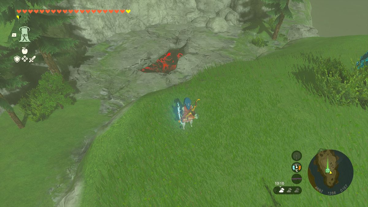 Link si trova vicino a un baratro nel terreno a Hyrule mentre cerca l'armatura del vento in Zelda Tears of the Kingdom.