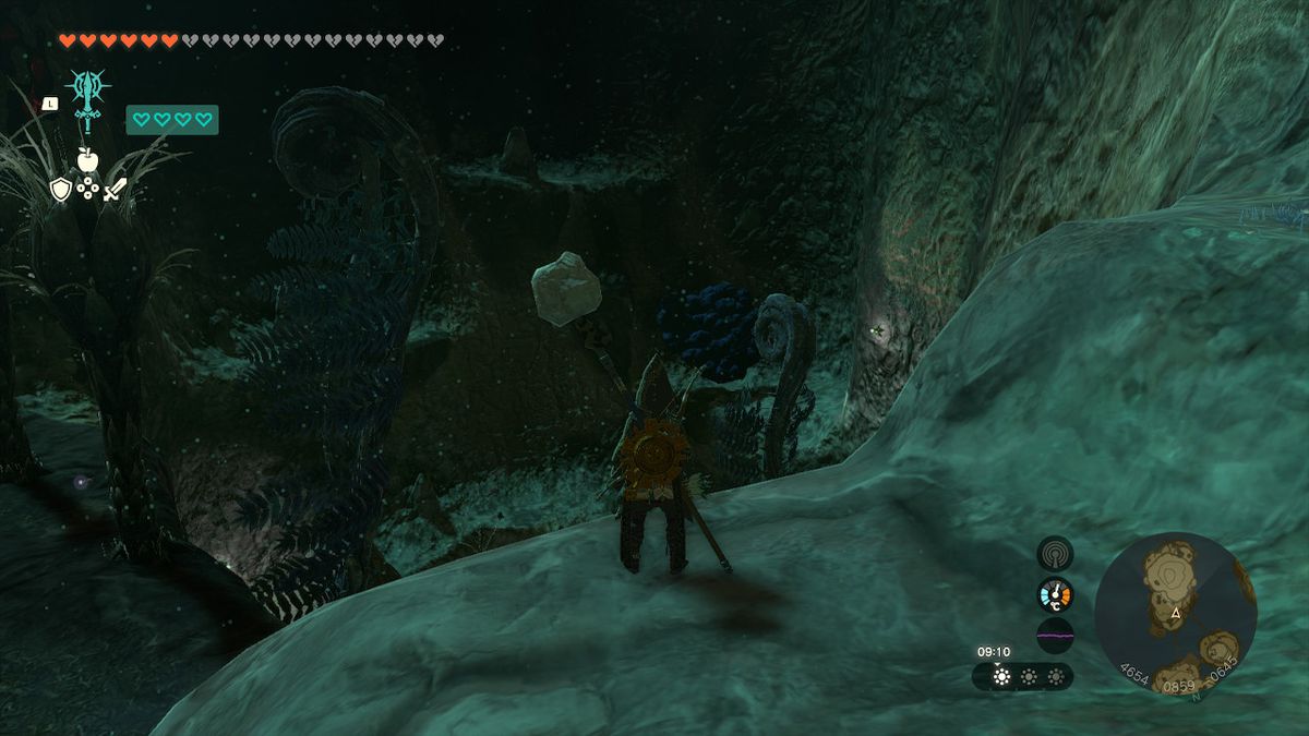 Link si trova su una sporgenza mentre cerca l'armatura del vento in Zelda Tears of the Kingdom.