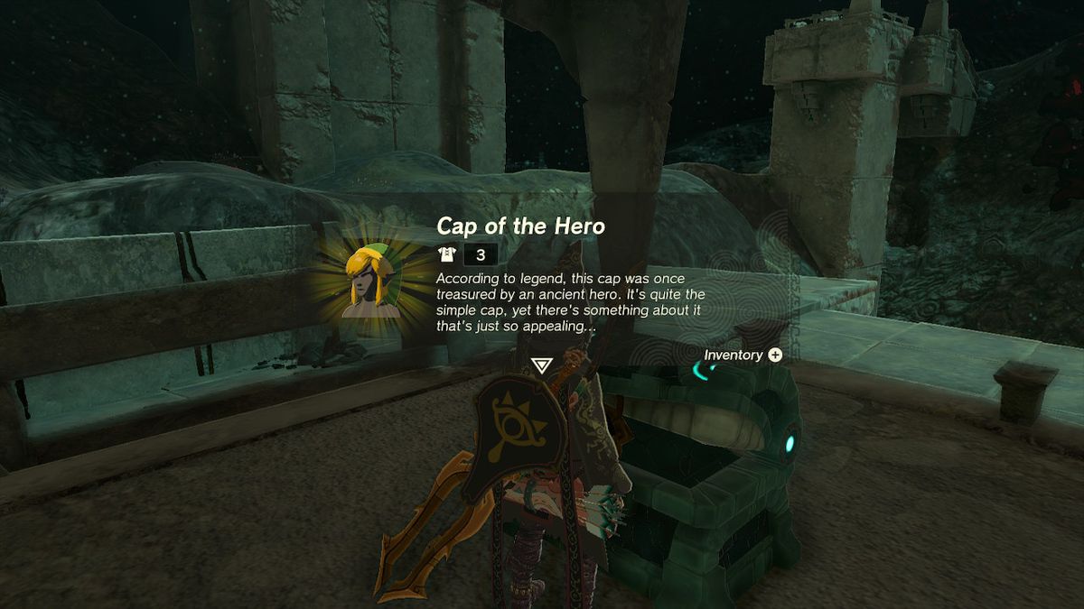 Link apre una cassa contenente il Cappello dell'Eroe, il copricapo dell'Armatura dell'Eroe, nelle Profondità in Zelda Tears of the Kingdom.