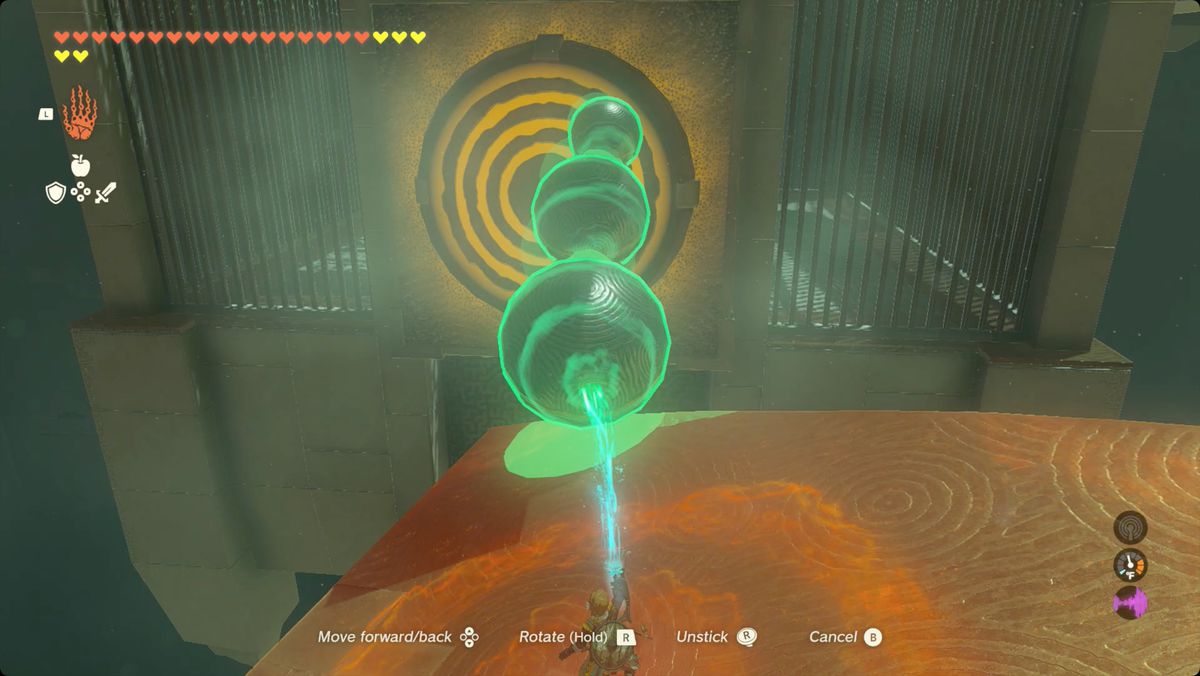 The Legend of Zelda: Tears of the Kingdom Link fa cadere una pila di palline contro un bersaglio nel Santuario di Iun-orok