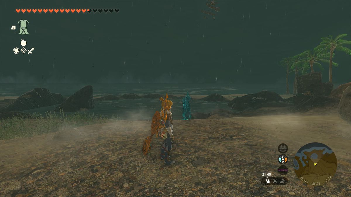 Link si trova su una spiaggia di notte alla ricerca dell'armatura fantasma in Zelda Tears of the Kingdom.