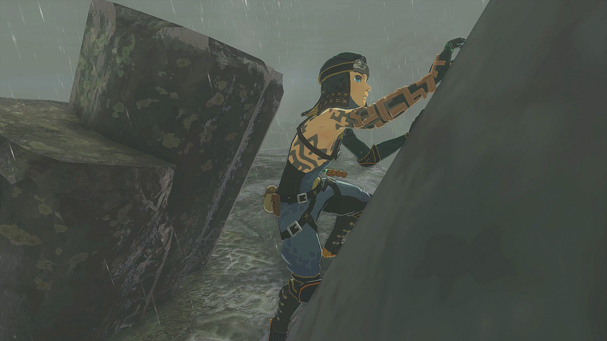 The Legend of Zelda: Tears of the Kingdom Link indossa il set Froggy Armor e si arrampica su una roccia sotto la pioggia