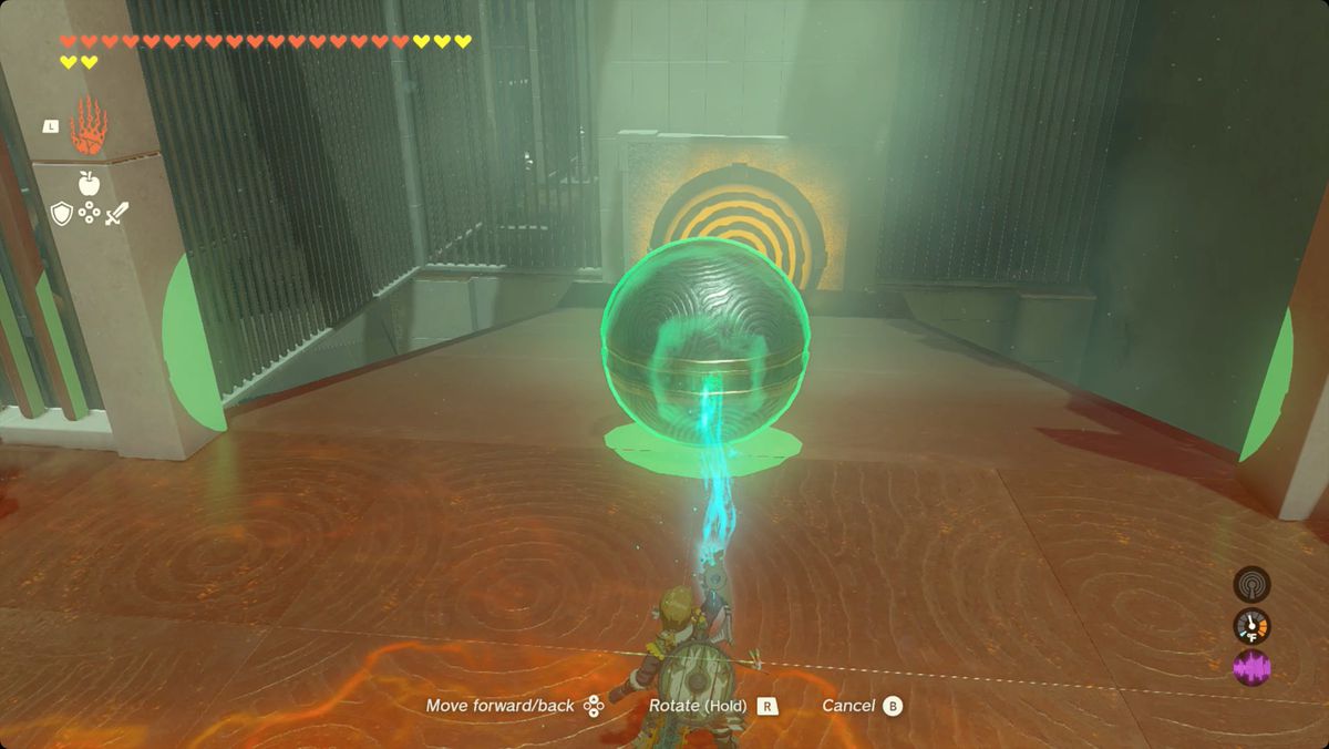 The Legend of Zelda: Tears of the Kingdom Link usa Ultrahand per far rotolare una palla giù da una rampa nel Santuario di Iun-orok