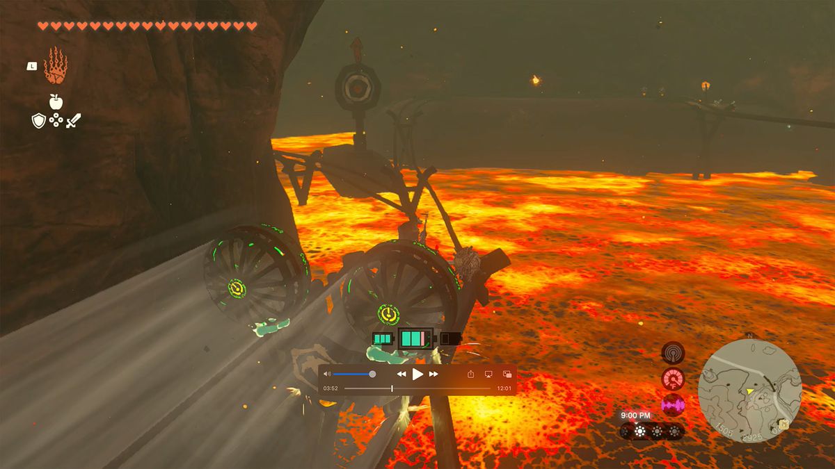 Link cavalca su un carrello da miniera attraverso una caverna piena di lava in uno screenshot di The Legend of Zelda: Tears of the Kingdom