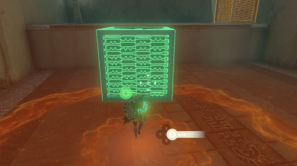 Un'immagine di Link che usa Ultrahand per spostare un cubo in The Legend of Zelda: Tears of the Kingdom.