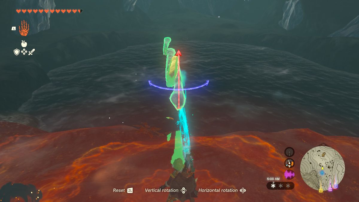 Link tiene tre lunghi ghiaccioli attaccati insieme a Ultrahand su uno stagno.