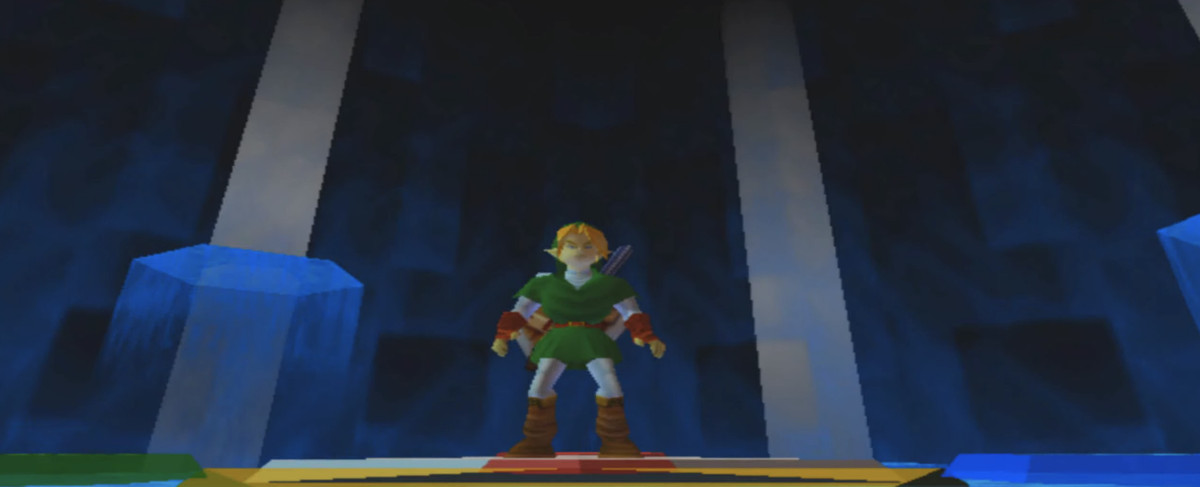 Link si trova nella Camera dei Saggi in The Legend of Zelda: Ocarina of Time.  Sembra un luogo spirituale con cristalli luminosi che emanano luce blu.